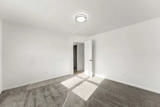 a bathroom with a sink a vanity and a toilet