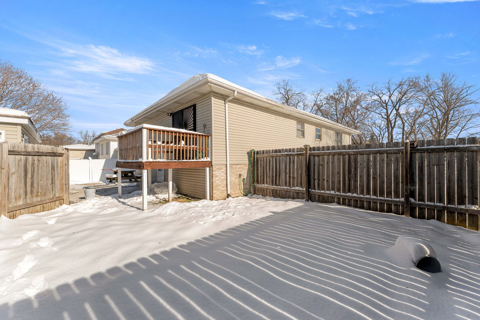 16446 Spaulding Avenue Markham, IL 60428 - Photo 24 of 27 a view of a house with a yard