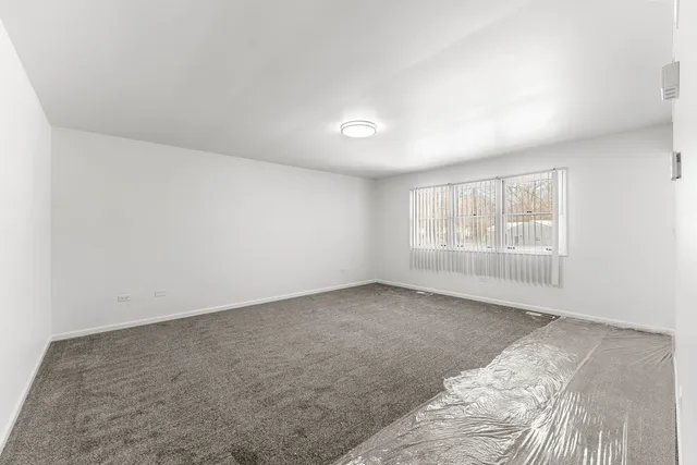 an empty room with a natural light