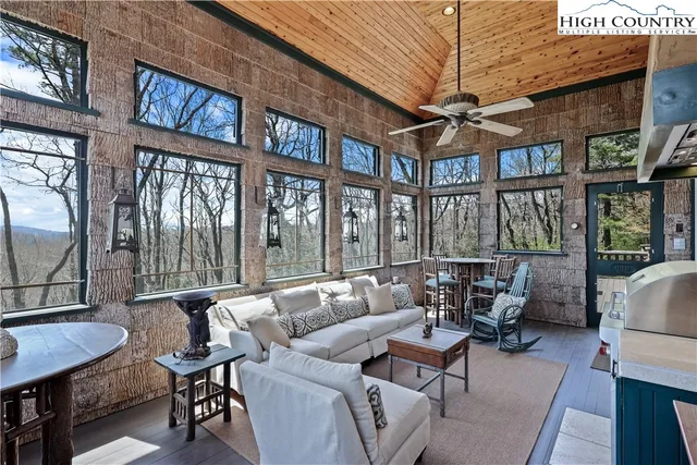 a kitchen with refrigerator and window