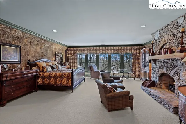 a bathroom with a double vanity sink toilet and shower