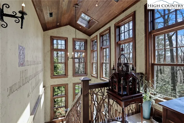 a kitchen with stainless steel appliances a stove a sink and a refrigerator