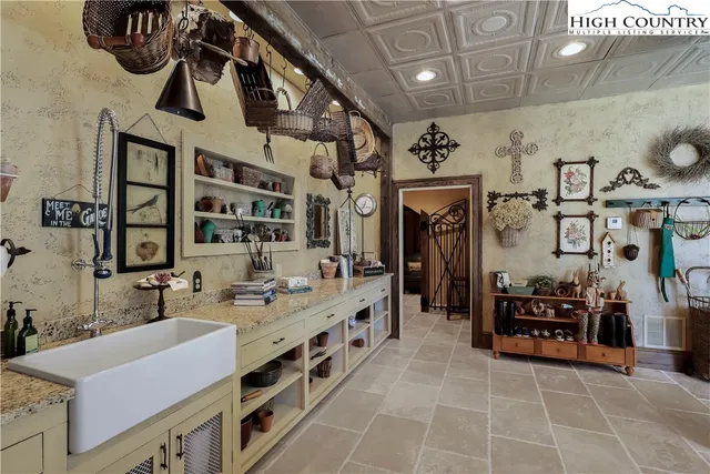 a view of entryway with furniture and a window