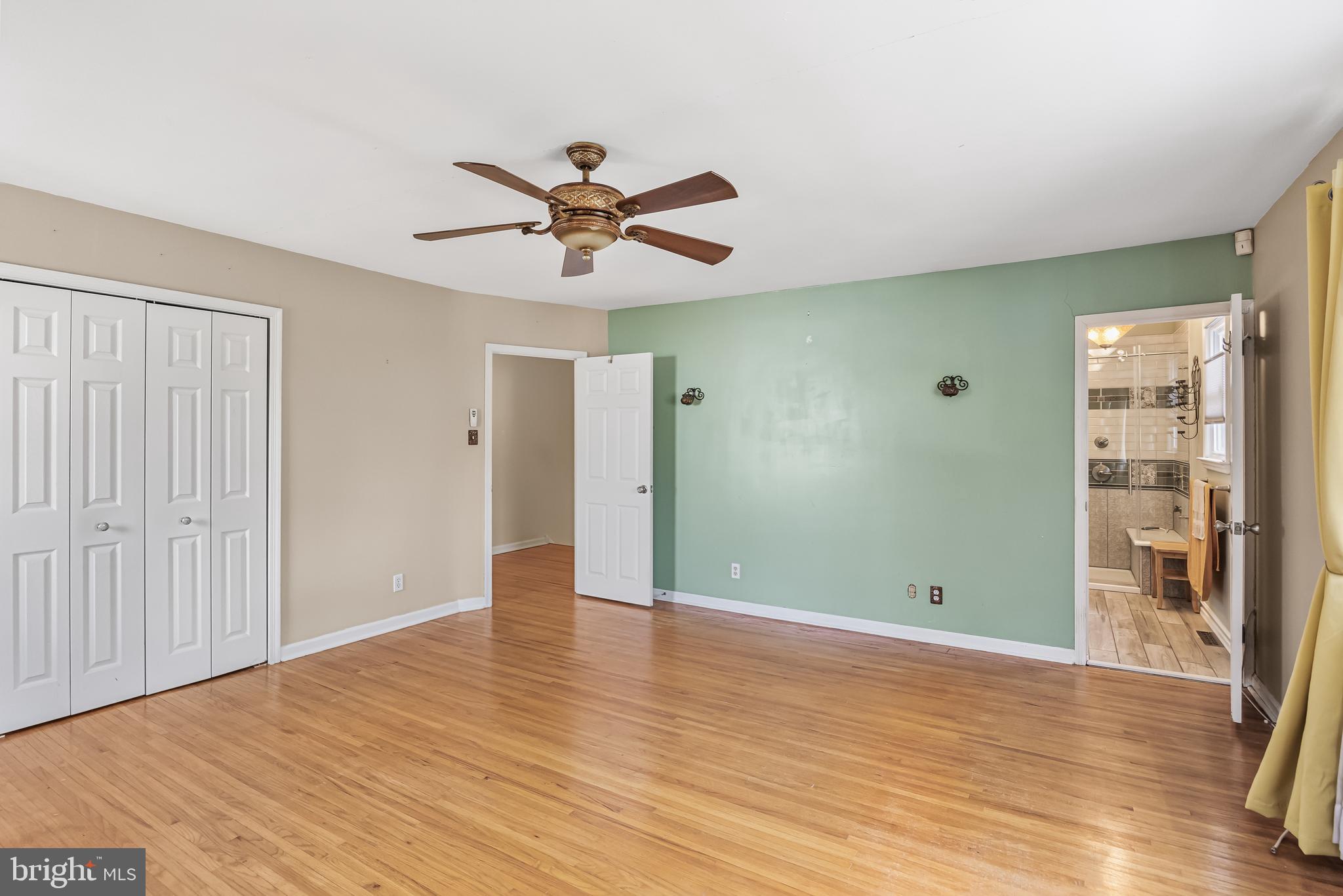 2802 Hunterdon Drive Cinnaminson, NJ 08077 - Photo 17 of 37 a view of empty room with wooden floor and fan