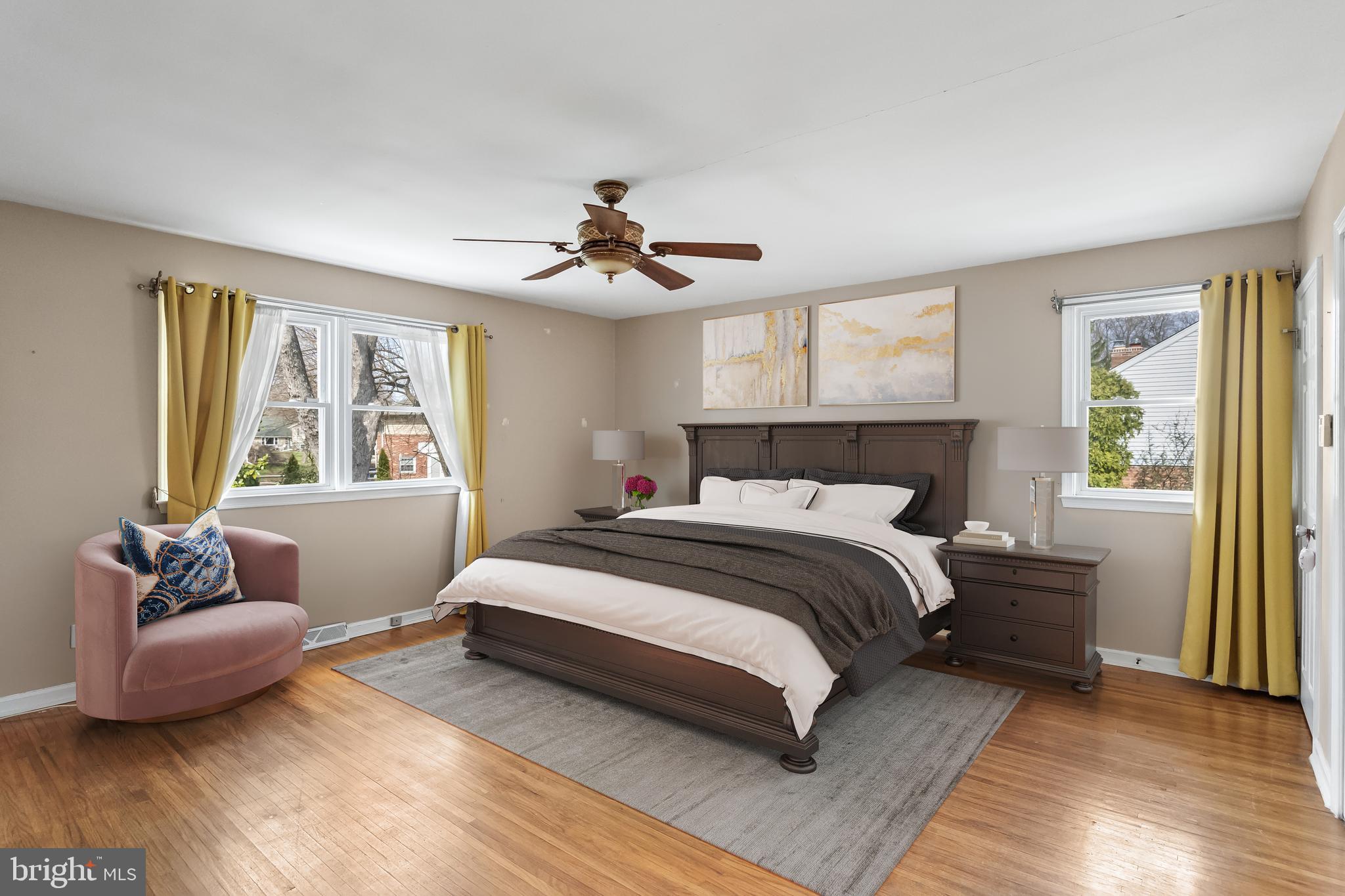 2802 Hunterdon Drive Cinnaminson, NJ 08077 - Photo 18 of 37 a spacious bedroom with a bed a couch and a window