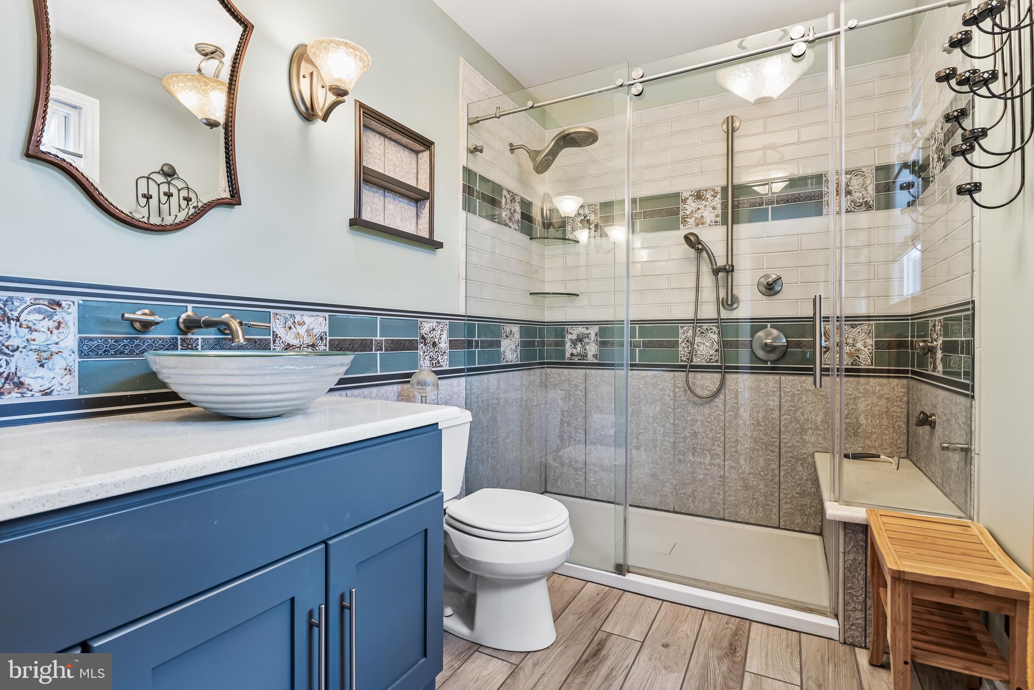 2802 Hunterdon Drive Cinnaminson, NJ 08077 - Photo 19 of 37 a bathroom with a sink a toilet and shower