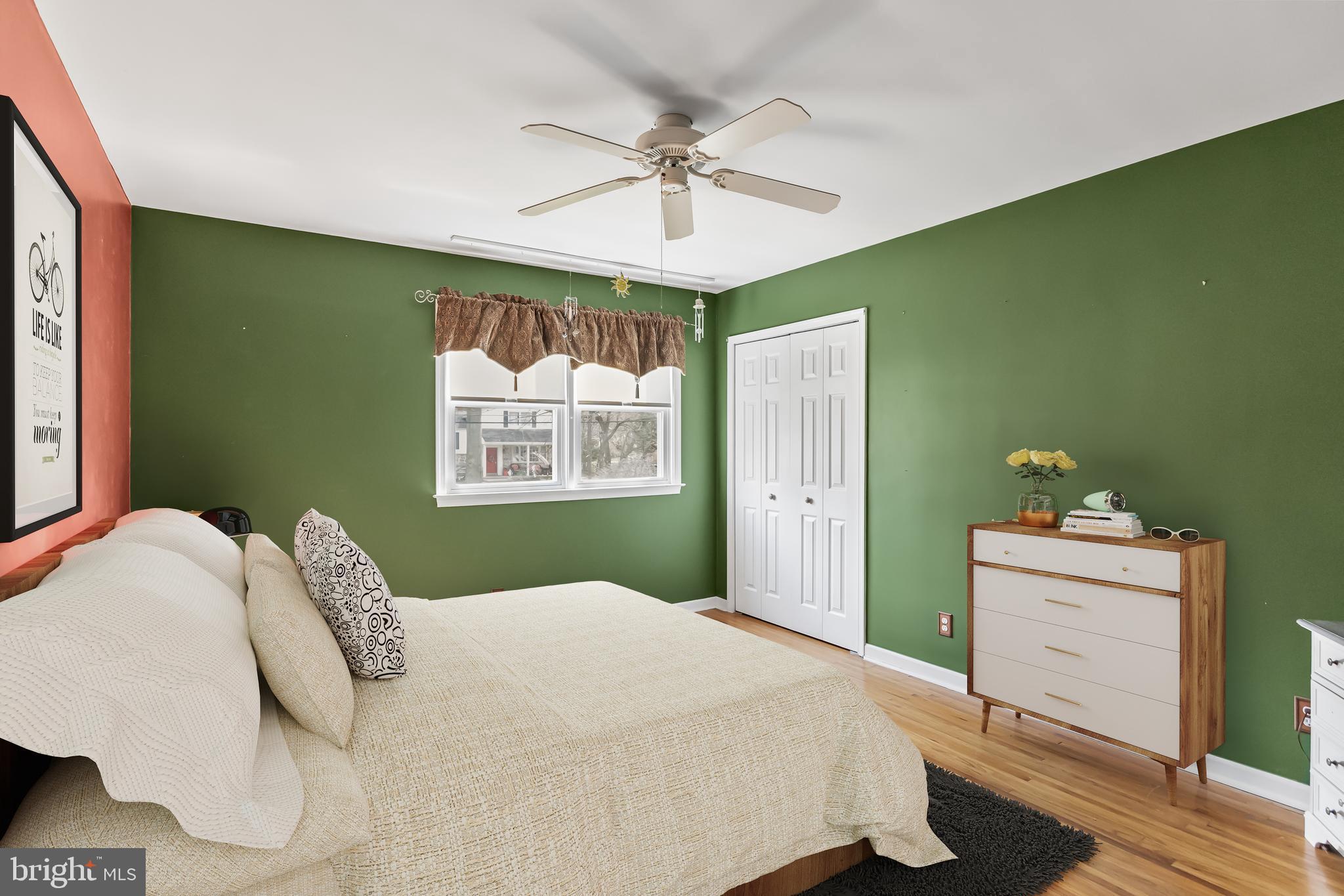 2802 Hunterdon Drive Cinnaminson, NJ 08077 - Photo 20 of 37 a bedroom with a bed and a chandelier