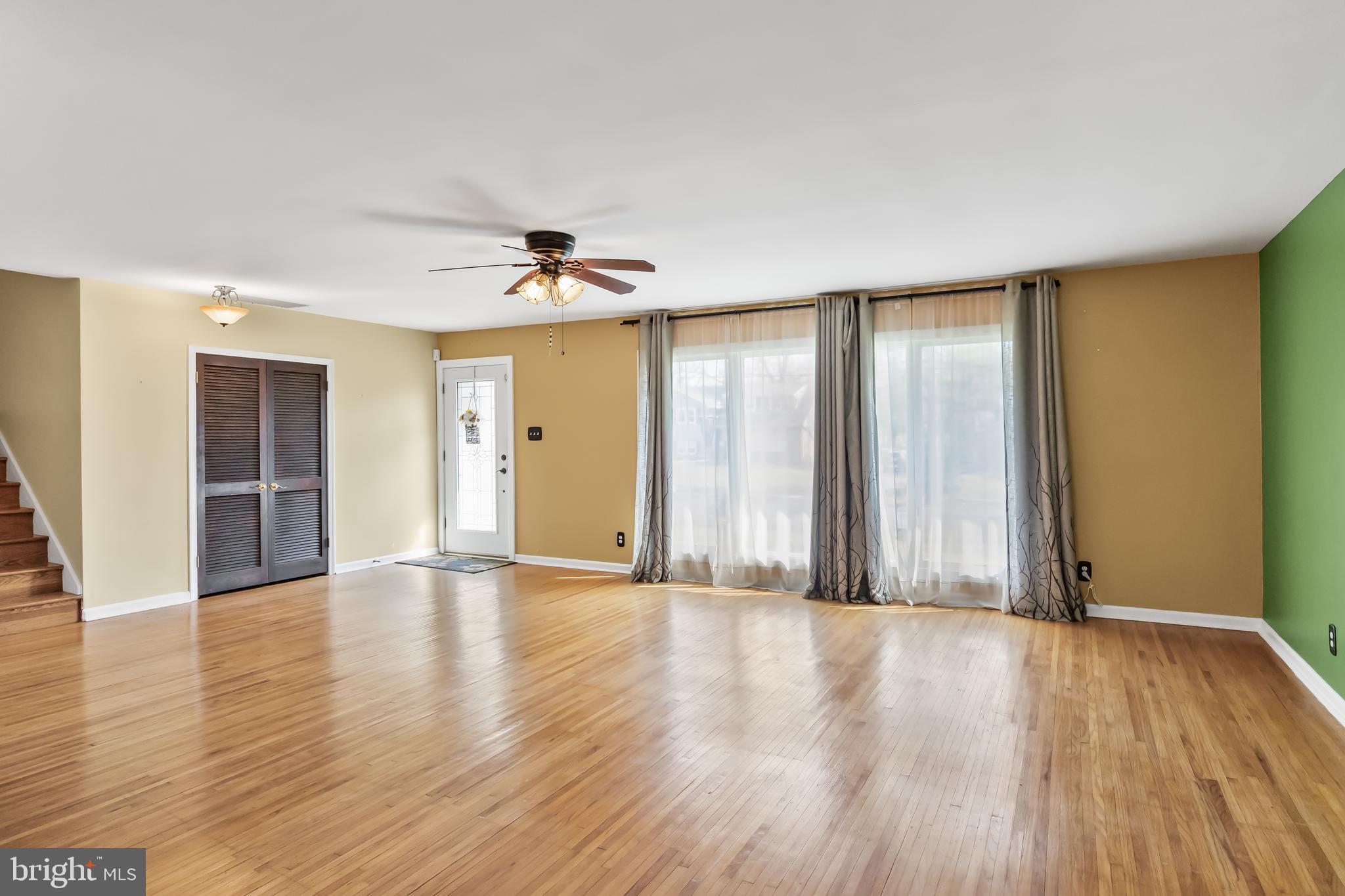 2802 Hunterdon Drive Cinnaminson, NJ 08077 - Photo 28 of 37 a view of an empty room with wooden floor and a window