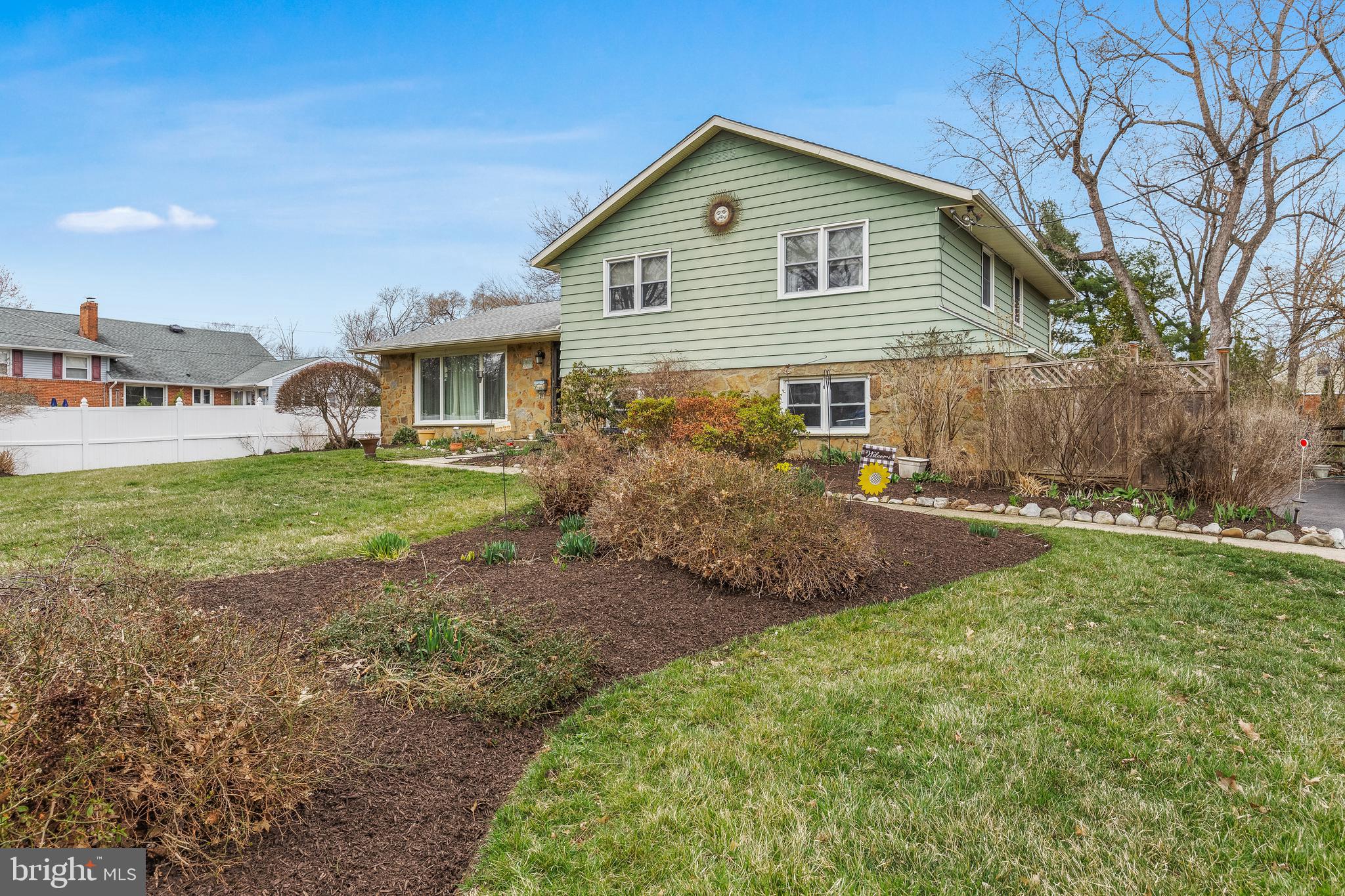 2802 Hunterdon Drive Cinnaminson, NJ 08077 - Photo 4 of 37 a front view of a house with a yard and garage