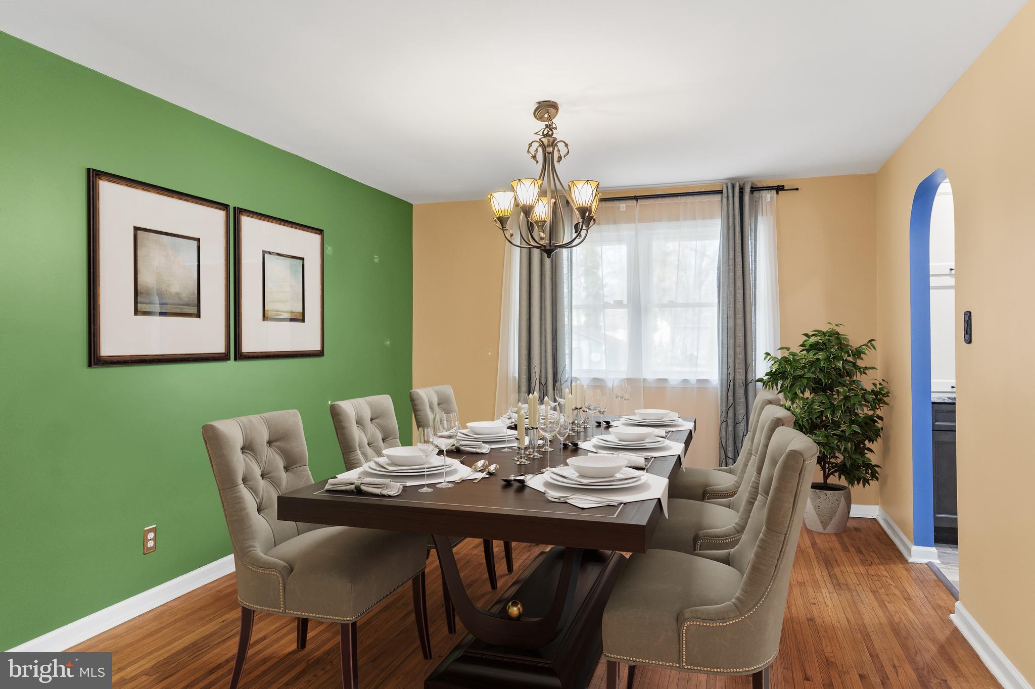 2802 Hunterdon Drive Cinnaminson, NJ 08077 - Photo 7 of 37 a dining room with furniture a large window and wooden floor