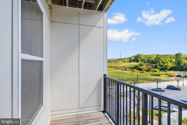 a view of a balcony with an outdoor space