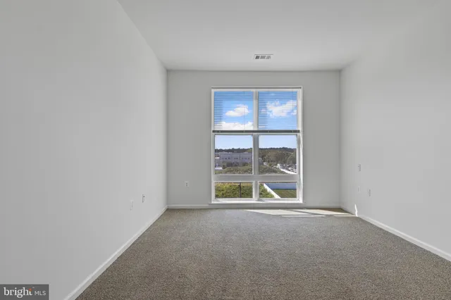 an empty room with window