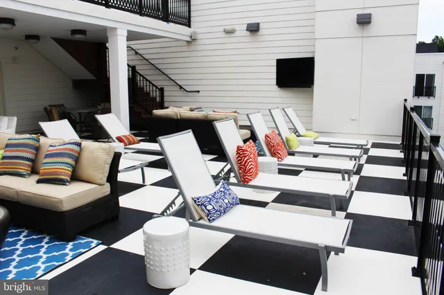 a view of a workspace with furniture