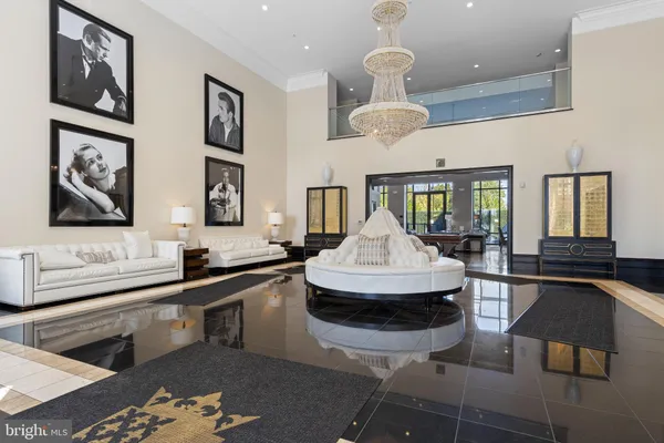 a kitchen with stainless steel appliances kitchen island granite countertop a sink and a stove