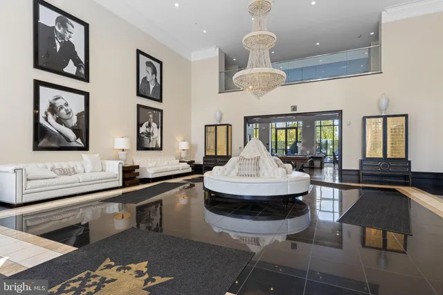 a kitchen with stainless steel appliances kitchen island granite countertop a sink and a stove