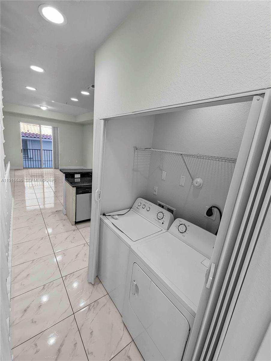 850 Southwest 14th Avenue, Unit 4 Miami, FL 33135 - Photo 17 of 30 a utility room with dryer and washer