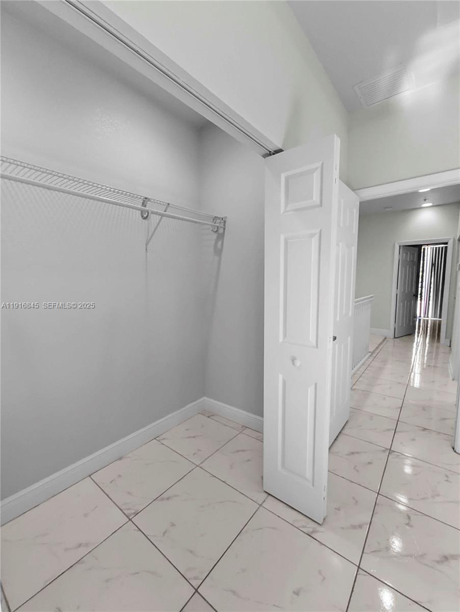 850 Southwest 14th Avenue, Unit 4 Miami, FL 33135 - Photo 21 of 30 a view of a room with a empty space