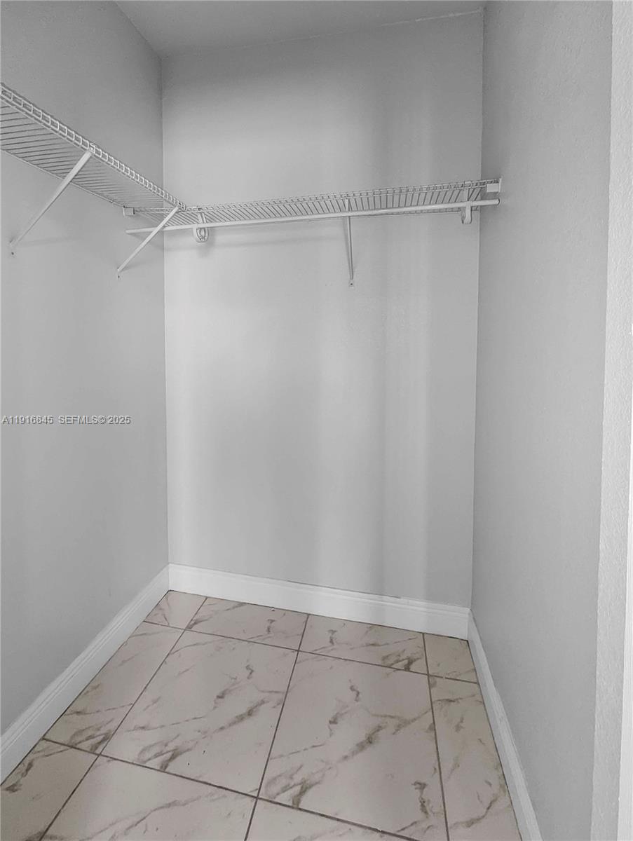 850 Southwest 14th Avenue, Unit 4 Miami, FL 33135 - Photo 24 of 30 a view of an empty walk in closet