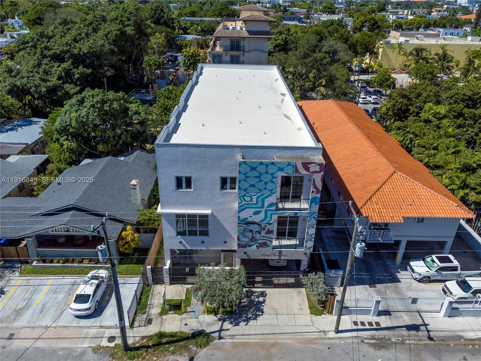 850 Southwest 14th Avenue, Unit 4 Miami, FL 33135 - Photo 28 of 30 an aerial view of a house with garden