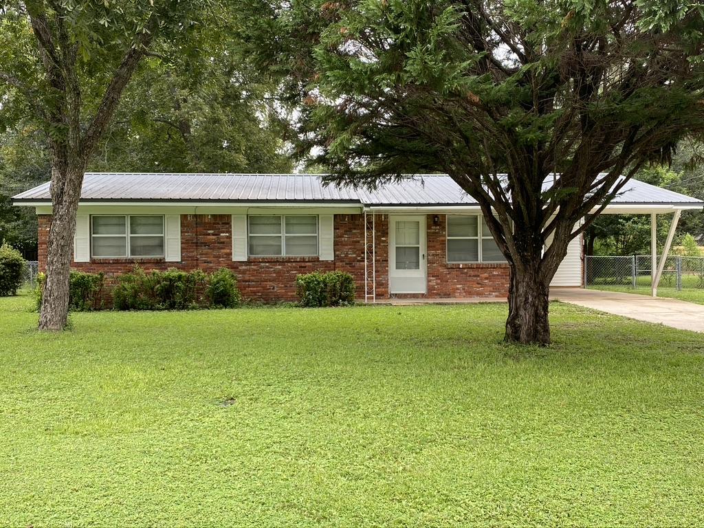 205 Powell Drive Crestview, FL 32536 - Photo 2 of 12 a front view of house with yard and green space
