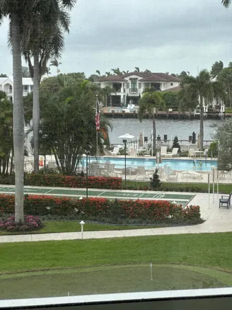 a house view with a lake view