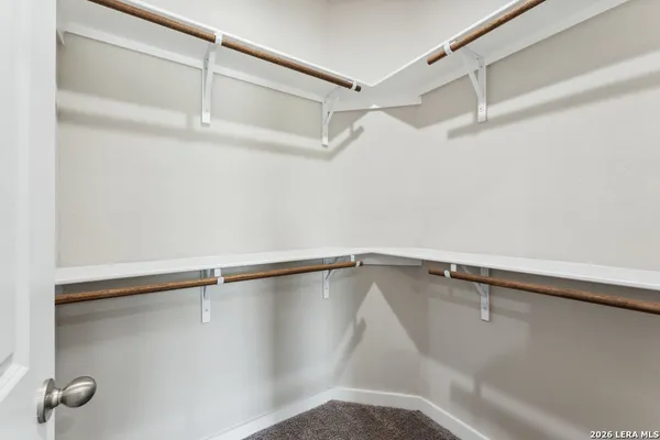 a view of a room with racks on the wall