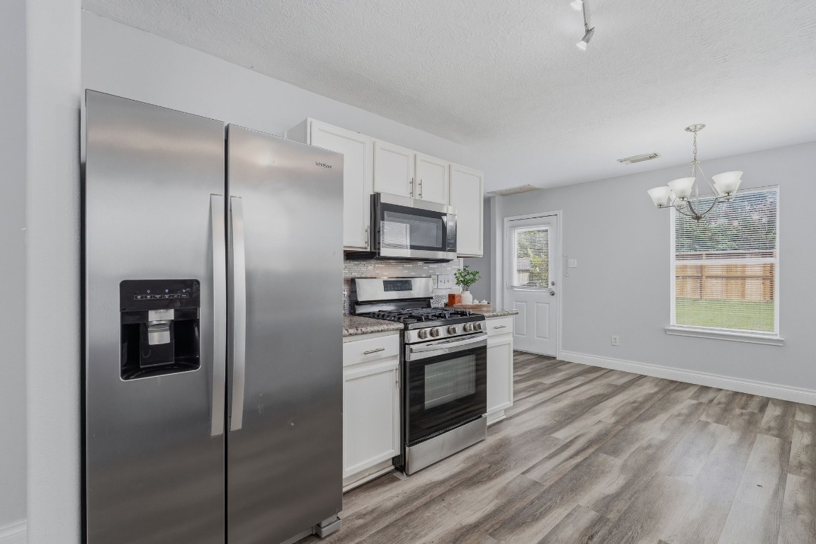 1427 Hade Falls Lane Houston, TX 77073 - Photo 11 of 31 Refrigerator is included