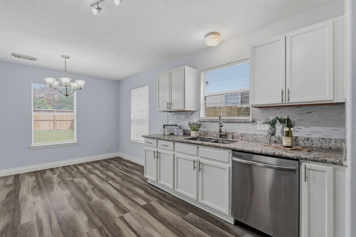 1427 Hade Falls Lane Houston, TX 77073 - Photo 12 of 31 The kitchen looking towards the charming breakfast room.