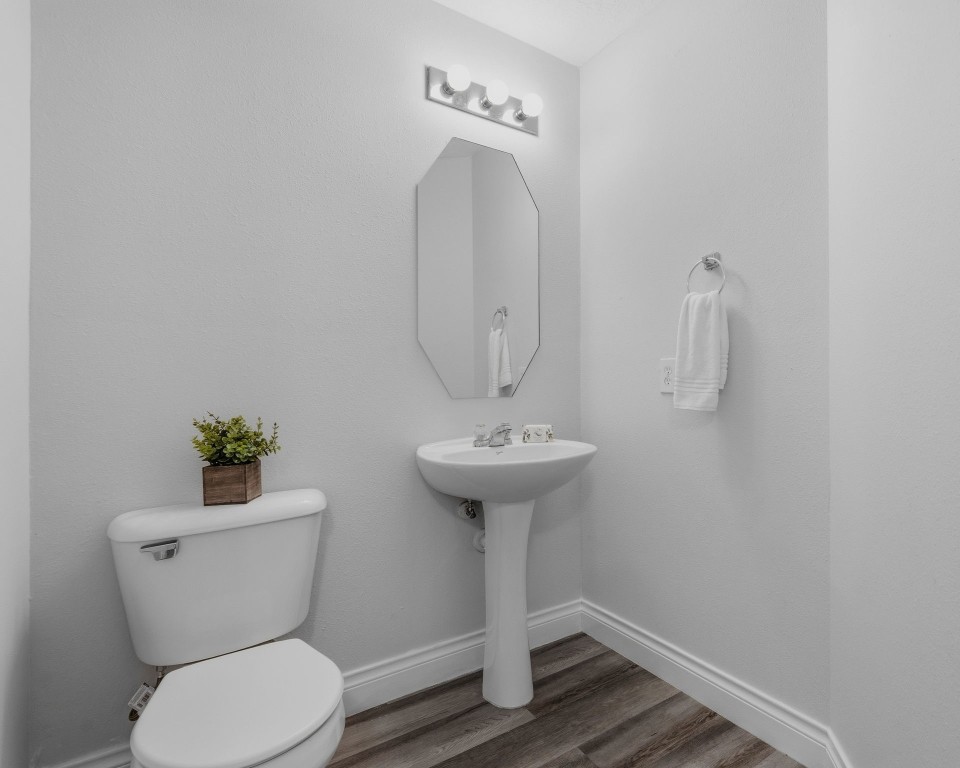 1427 Hade Falls Lane Houston, TX 77073 - Photo 15 of 31 Guest Bath Down features a pedestal sink.