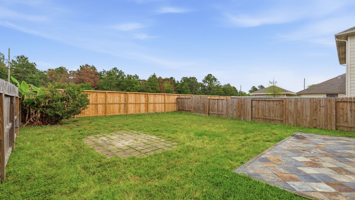 1427 Hade Falls Lane Houston, TX 77073 - Photo 26 of 31 Spacious fenced backyard with no rear neighbors for added privacy.