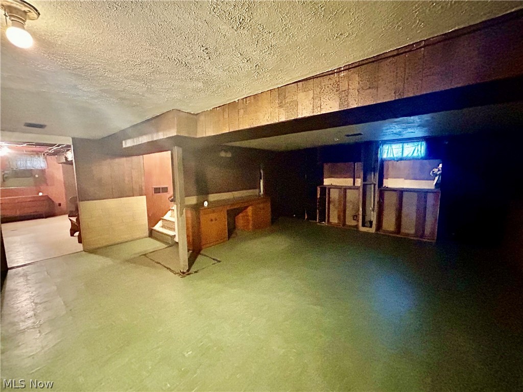 501 Edison Street Struthers, OH 44471 - Photo 18 of 23 Recroom with refrigerator. Bar was removed