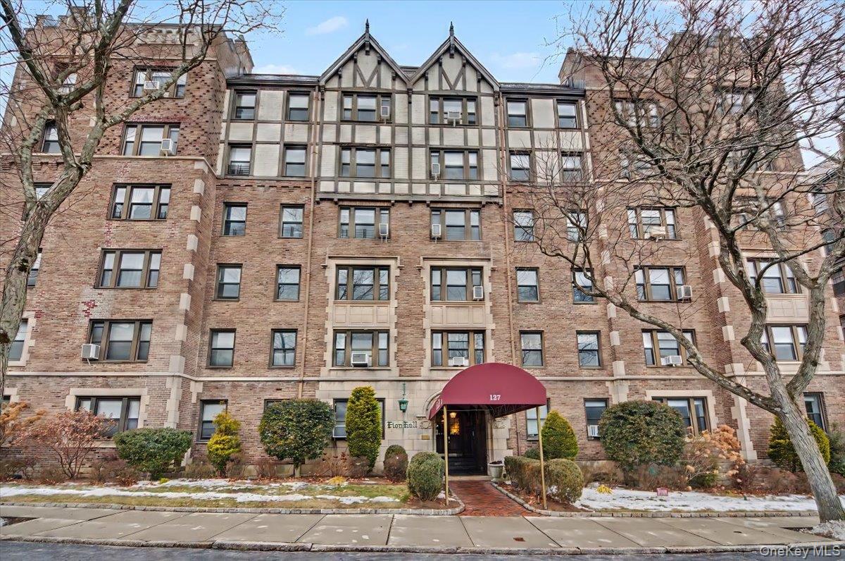 a front view of a building with balcony