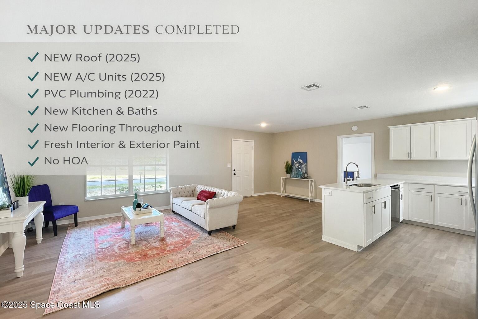 983 Vangi Lane Northeast Palm Bay, FL 32905 - Photo 11 of 35 Family/Kitchen