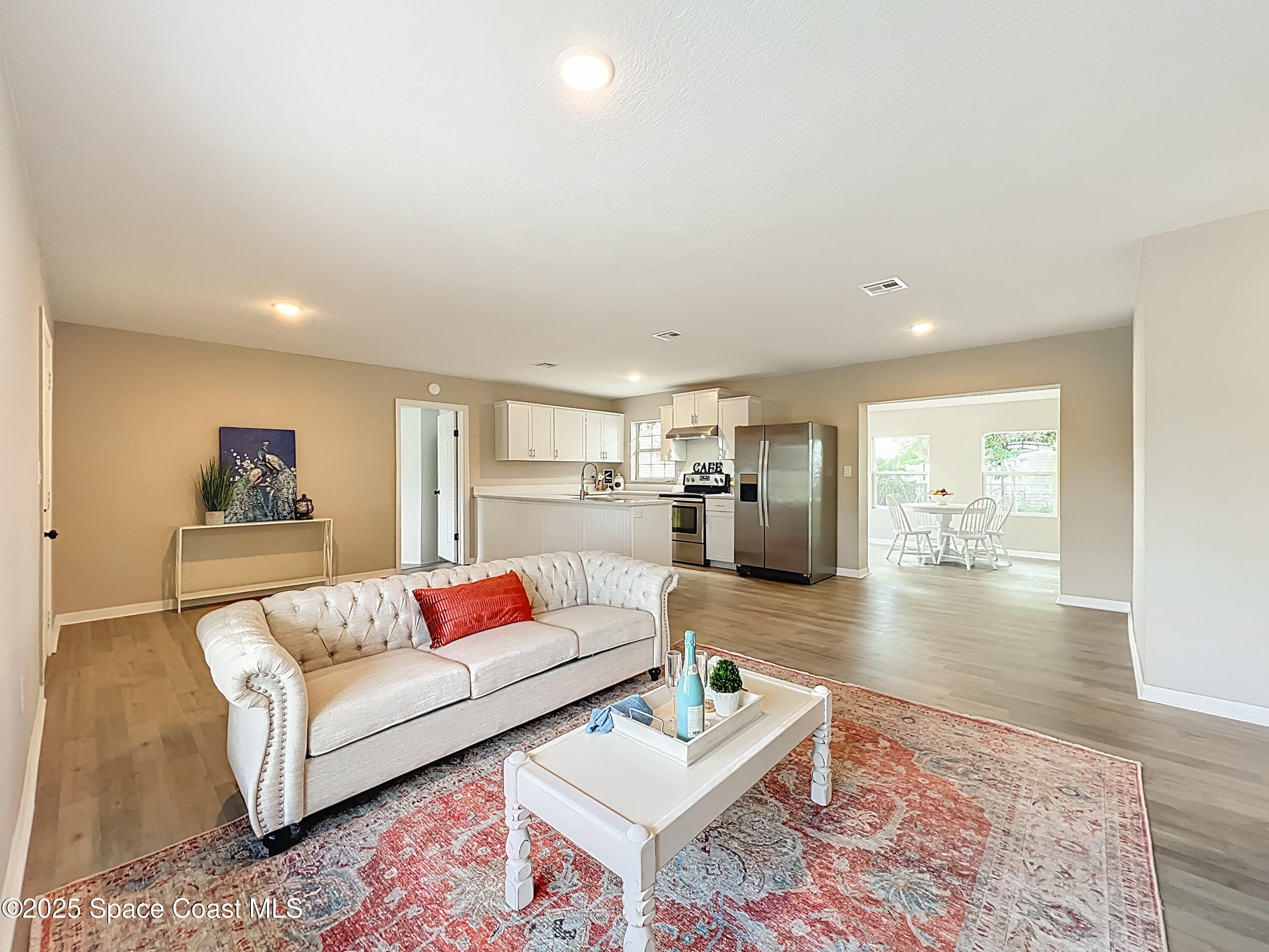 983 Vangi Lane Northeast Palm Bay, FL 32905 - Photo 12 of 35 Living room