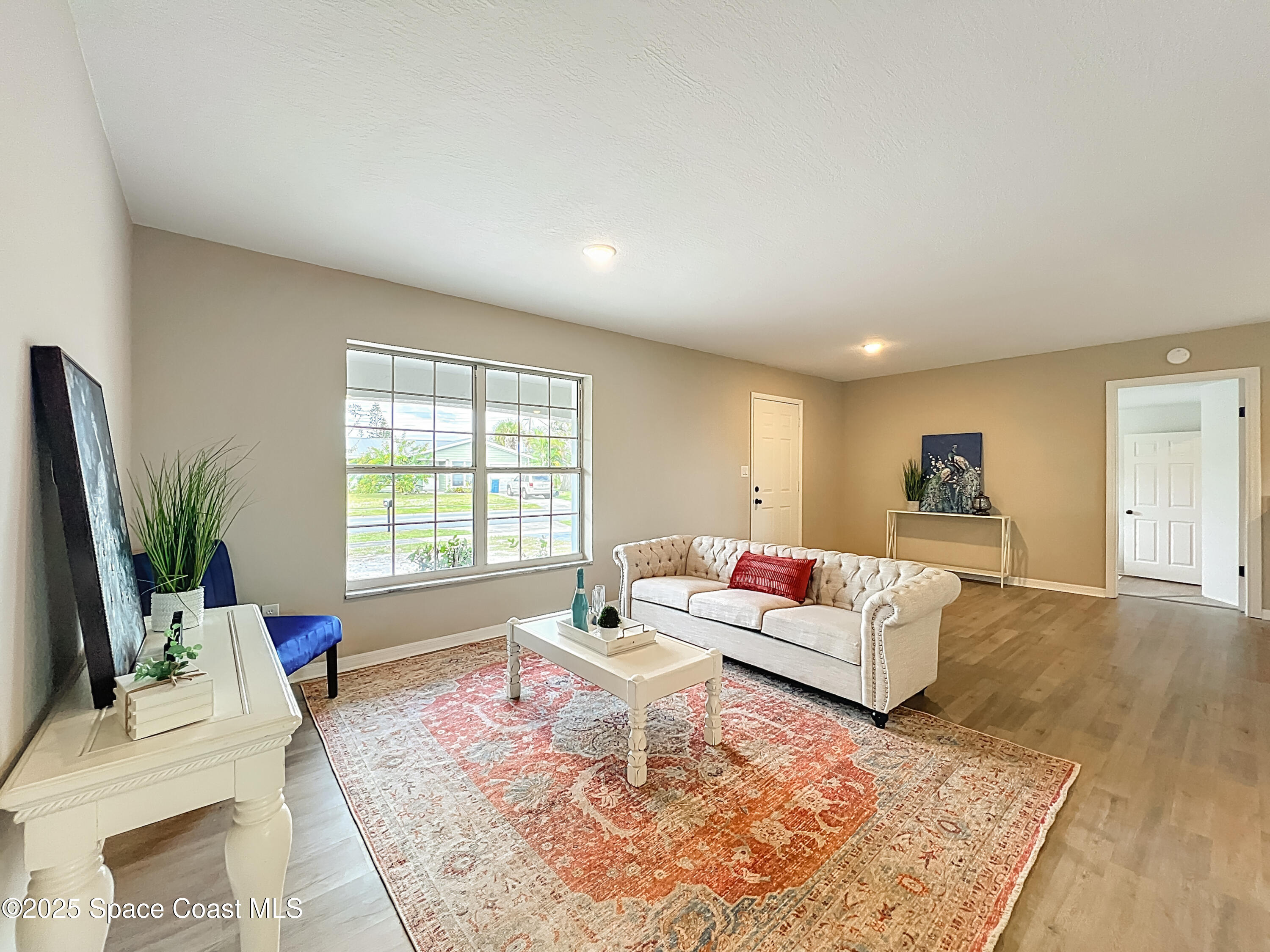 983 Vangi Lane Northeast Palm Bay, FL 32905 - Photo 13 of 35 Living