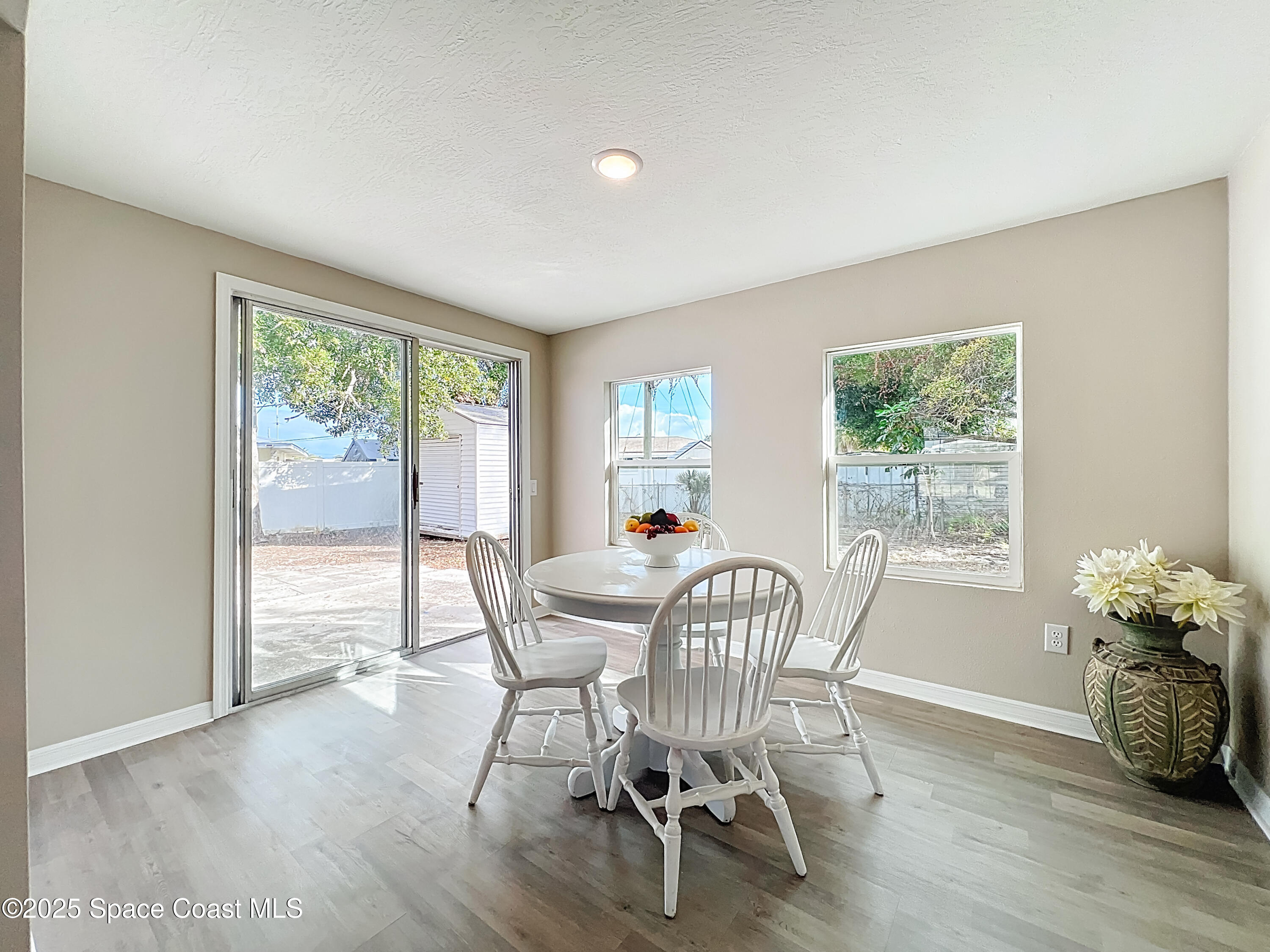983 Vangi Lane Northeast Palm Bay, FL 32905 - Photo 22 of 35 Dining room