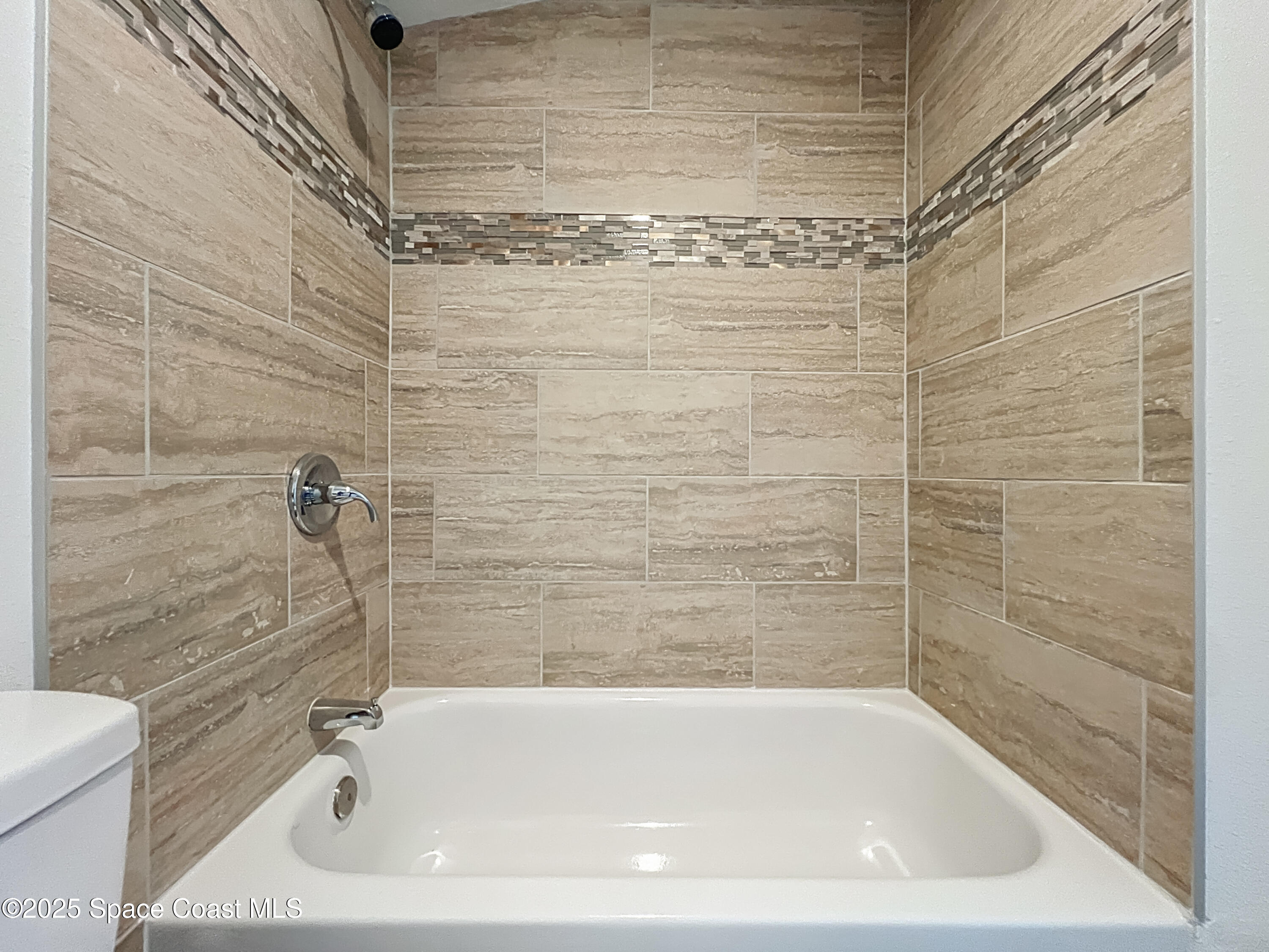 983 Vangi Lane Northeast Palm Bay, FL 32905 - Photo 27 of 35 Primary bath shower