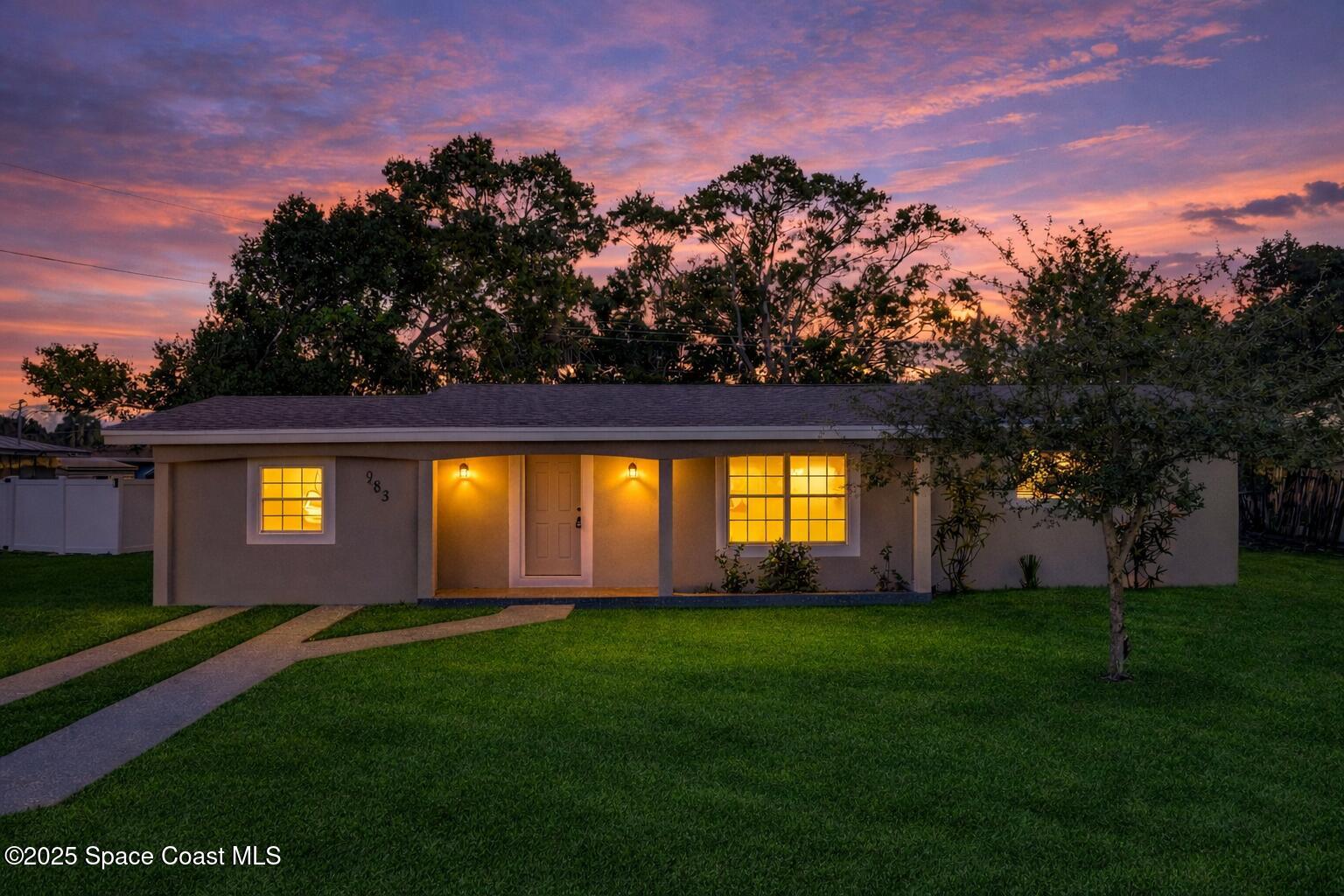 983 Vangi Lane Northeast Palm Bay, FL 32905 - Photo 3 of 35 twightlight image