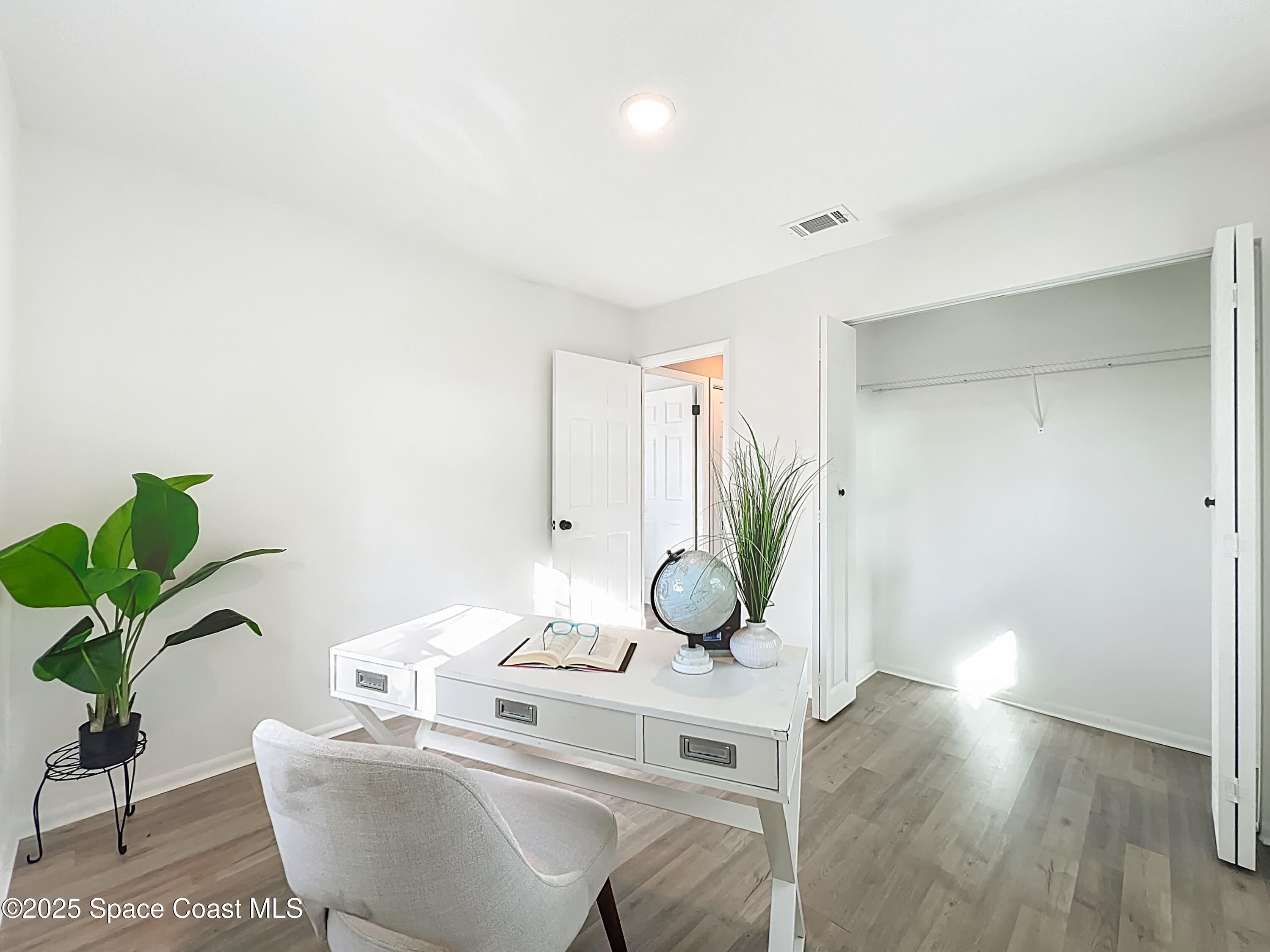 983 Vangi Lane Northeast Palm Bay, FL 32905 - Photo 31 of 35 Guest bedroom 1