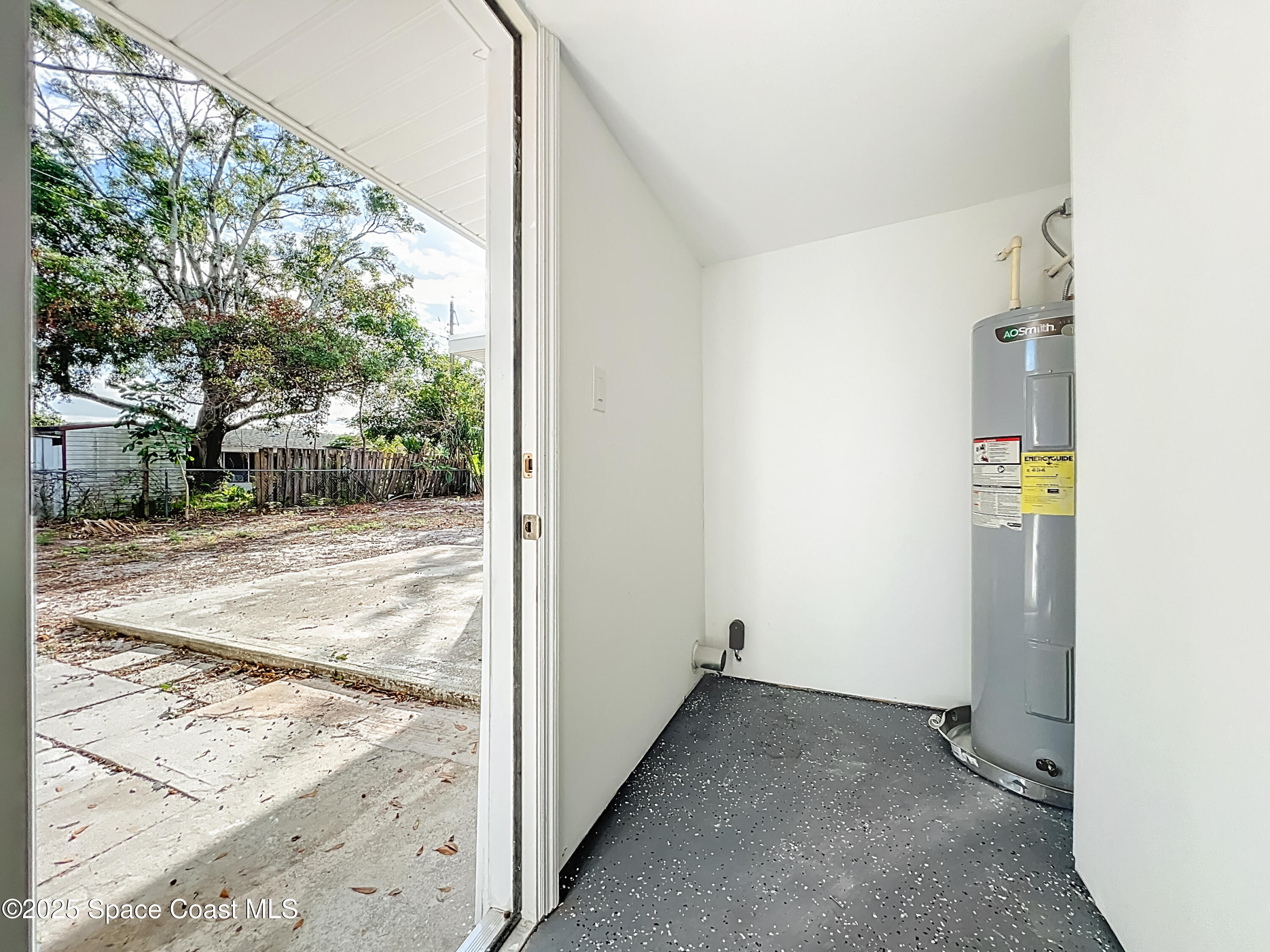 983 Vangi Lane Northeast Palm Bay, FL 32905 - Photo 34 of 35 Laundry room