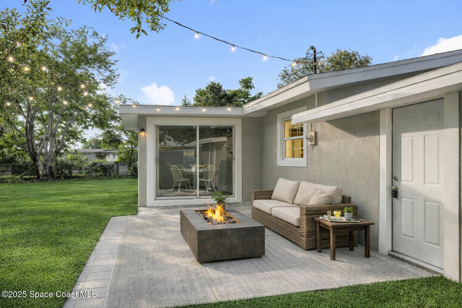 983 Vangi Lane Northeast Palm Bay, FL 32905 - Photo 5 of 35 Backyard patio-outdoor living