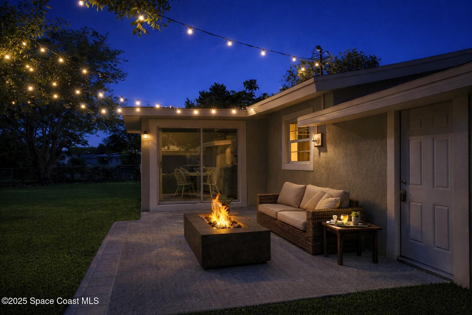 983 Vangi Lane Northeast Palm Bay, FL 32905 - Photo 6 of 35 Evening patio ambiance