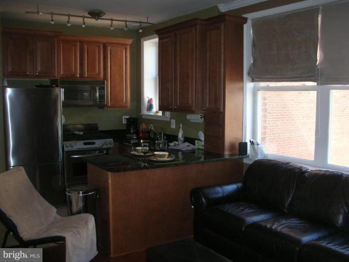 1438 Columbia Road Northwest, Unit 306 Washington, DC 20009 - Photo 8 of 15 Kitchen/Living Room