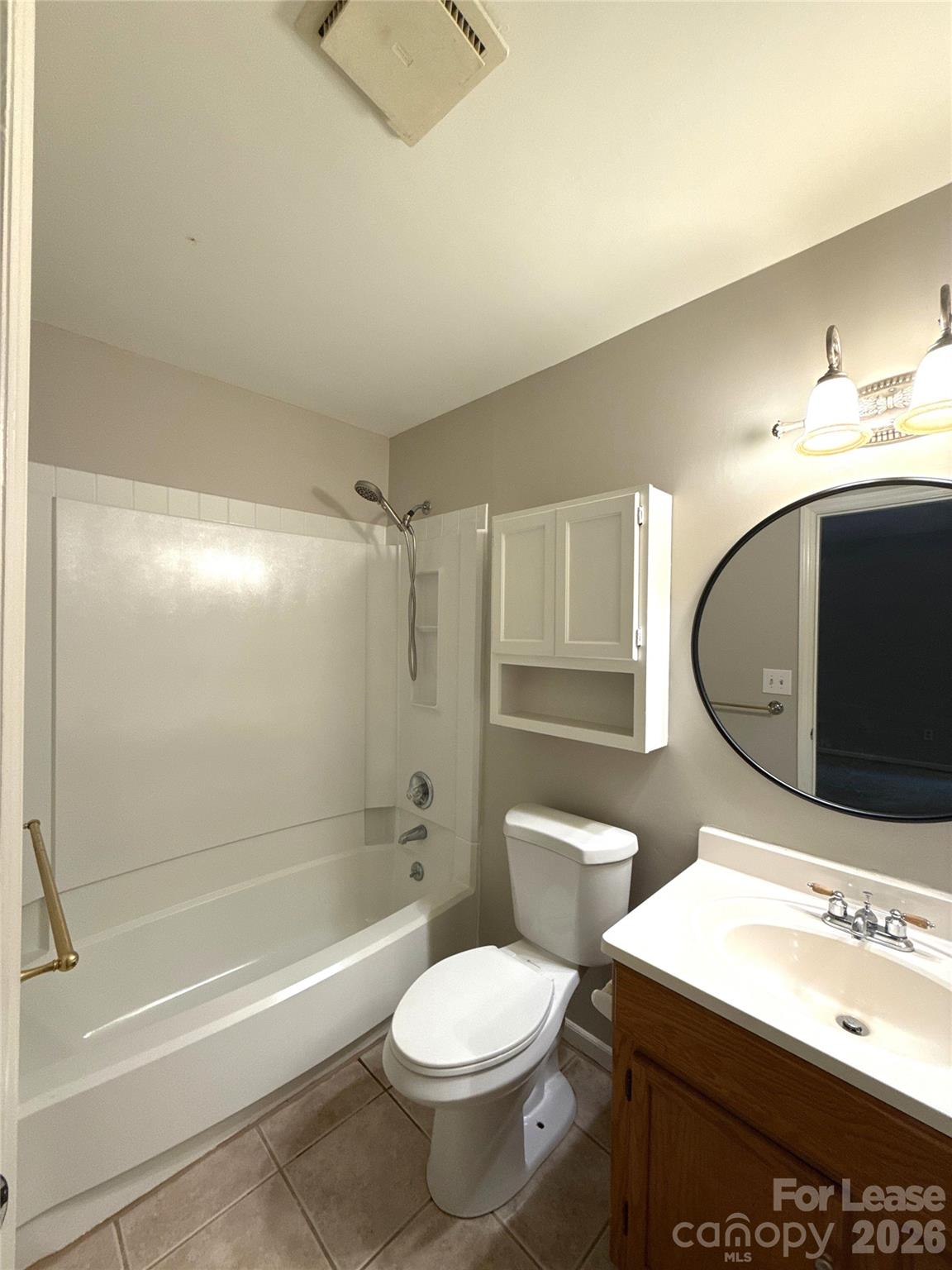 11002 Harrowfield Road Charlotte, NC 28226 - Photo 11 of 16 a bathroom with a sink toilet and shower