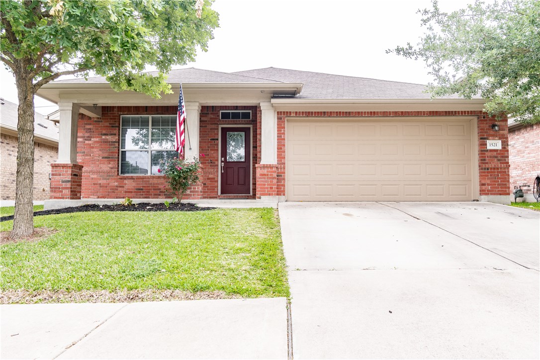 1521 Stone Rim Loop Buda, TX 78610 - Photo 1 of 1 a front view of house with yard