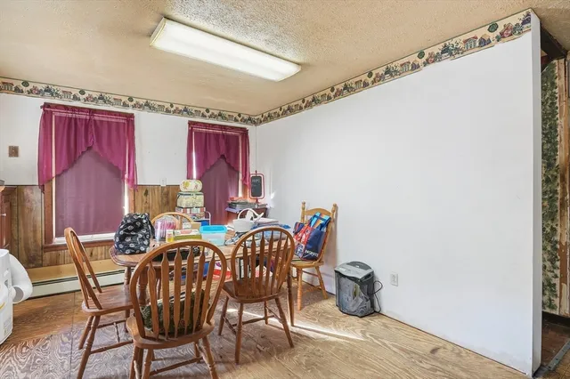 a view of a dining room with furniture