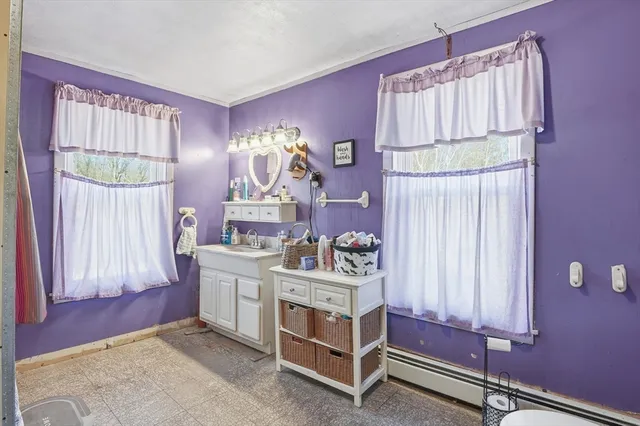 a bed room with a bed and a window