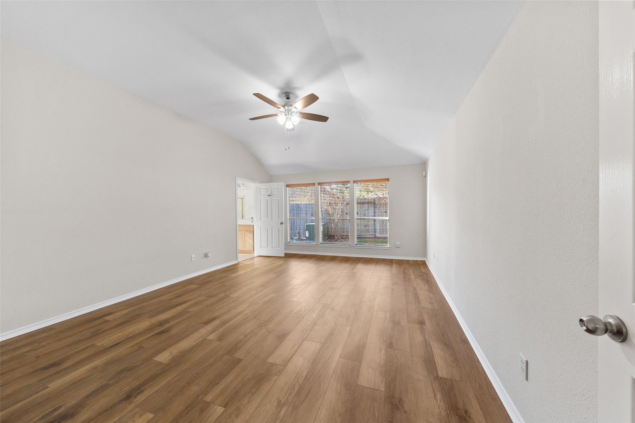 2443 Morgan Ridge Lane Spring, TX 77386 - Photo 15 of 26 wooden floor in an empty room with a window