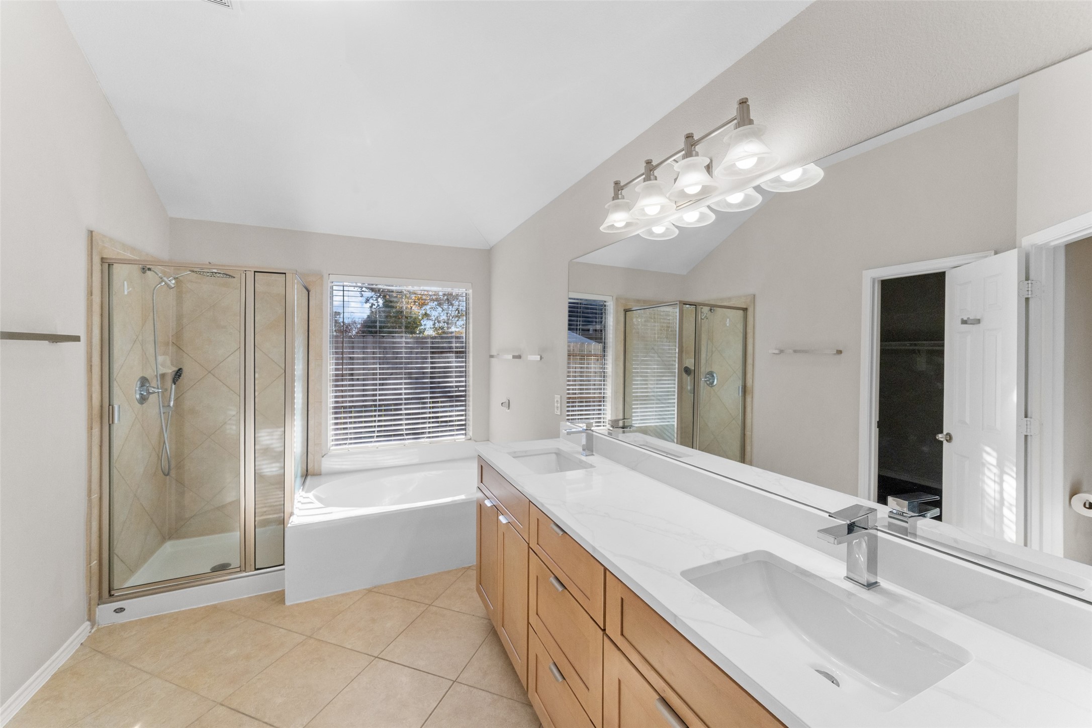 2443 Morgan Ridge Lane Spring, TX 77386 - Photo 17 of 26 a spacious bathroom with a tub sink and shower