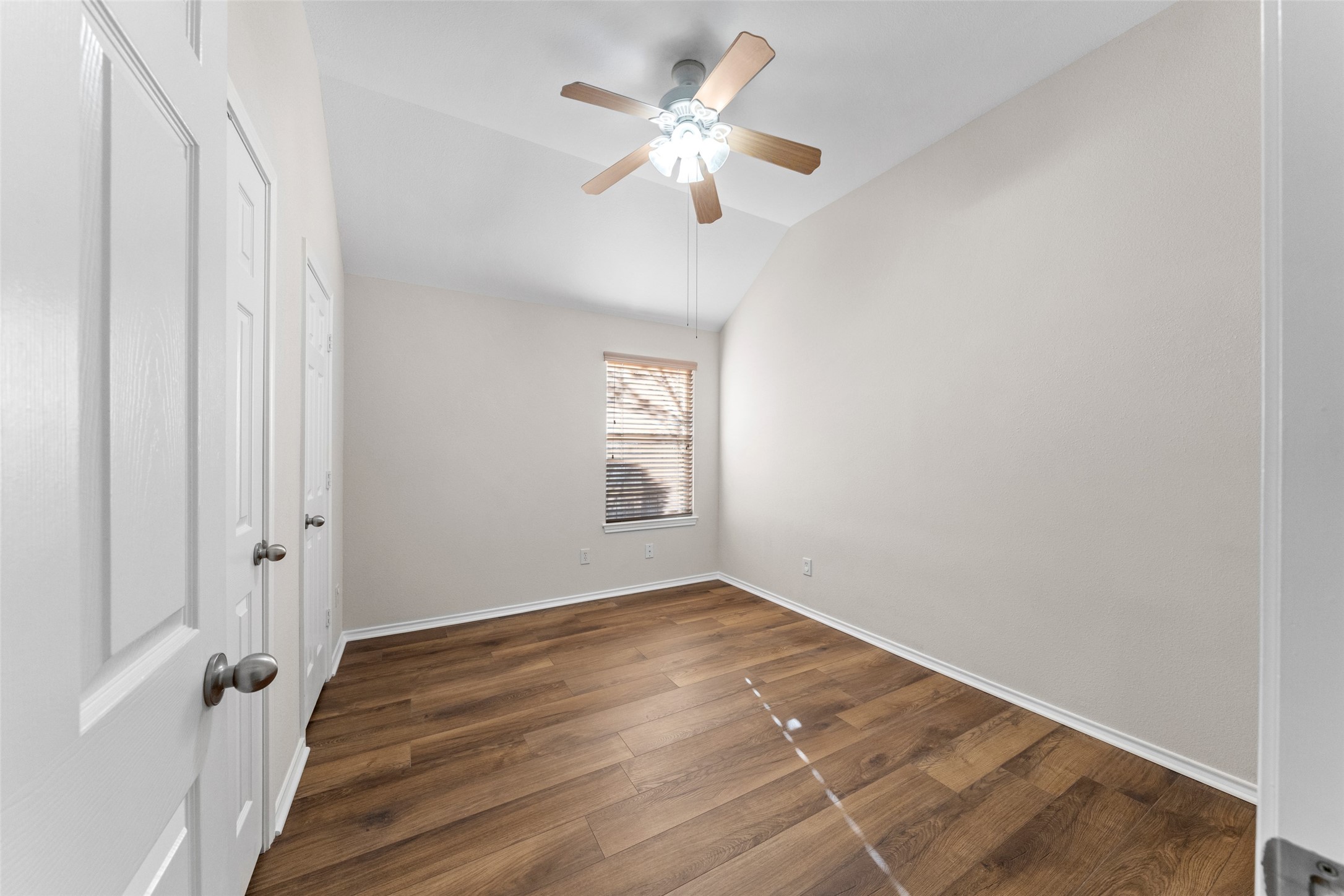 2443 Morgan Ridge Lane Spring, TX 77386 - Photo 20 of 26 wooden floor in an empty room with a window